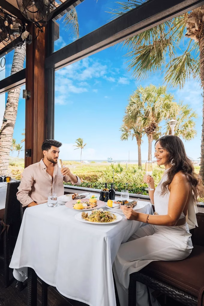 Beach-facing terrace dining at Ocean Grill at The Setai in Mid-Beach