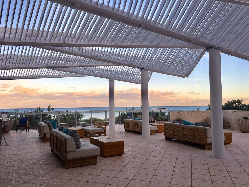 Sunset oceanfront terrace dining at The Strand in Miami Beach