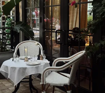 Outdoor terrace table at Le Basilic in Miami Beach
