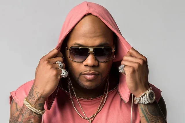 Flo Rida performing live during New Years Eve Miami 2026 at Bayfront Park, energizing the crowd with party anthems.