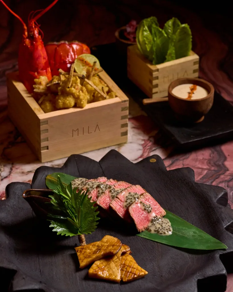 MILA Miami signature dish with modern plating, fresh ingredients, and elegant fine-dining presentation.