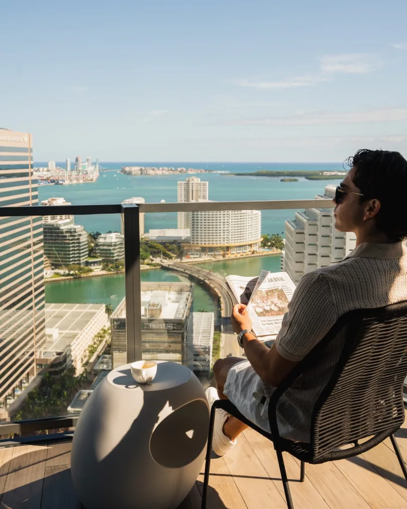 Sugar Miami rooftop exterior with lush greenery, open-air seating, and panoramic city views