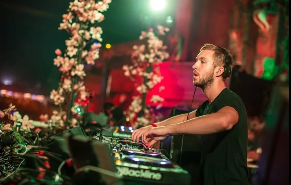 Calvin Harris performing a sunset DJ set at Palm Tree Club Miami