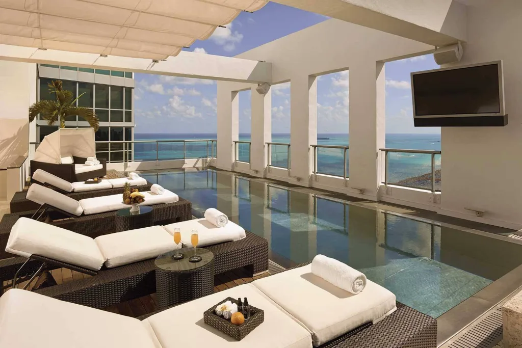 Oceanfront pools and palm-lined deck at The Setai Miami Beach
