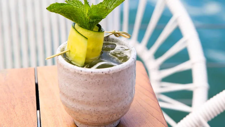 Fresh mint cocktail with cucumber garnish served at Lido Bayside Grill in Miami Beach