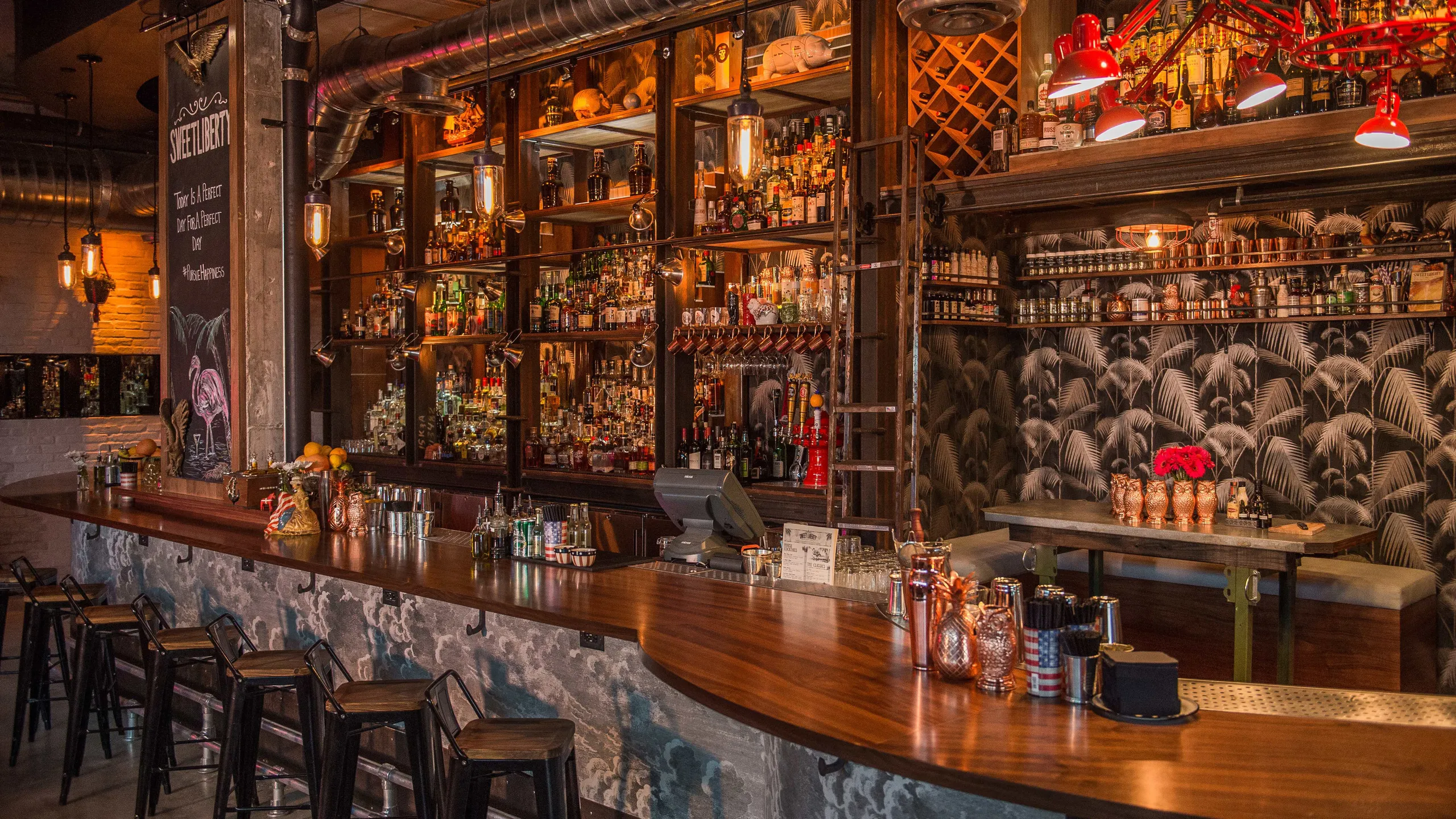 Interior bar of Sweet Liberty Drinks & Supply Company in Miami Beach with craft cocktail lounge atmosphere
