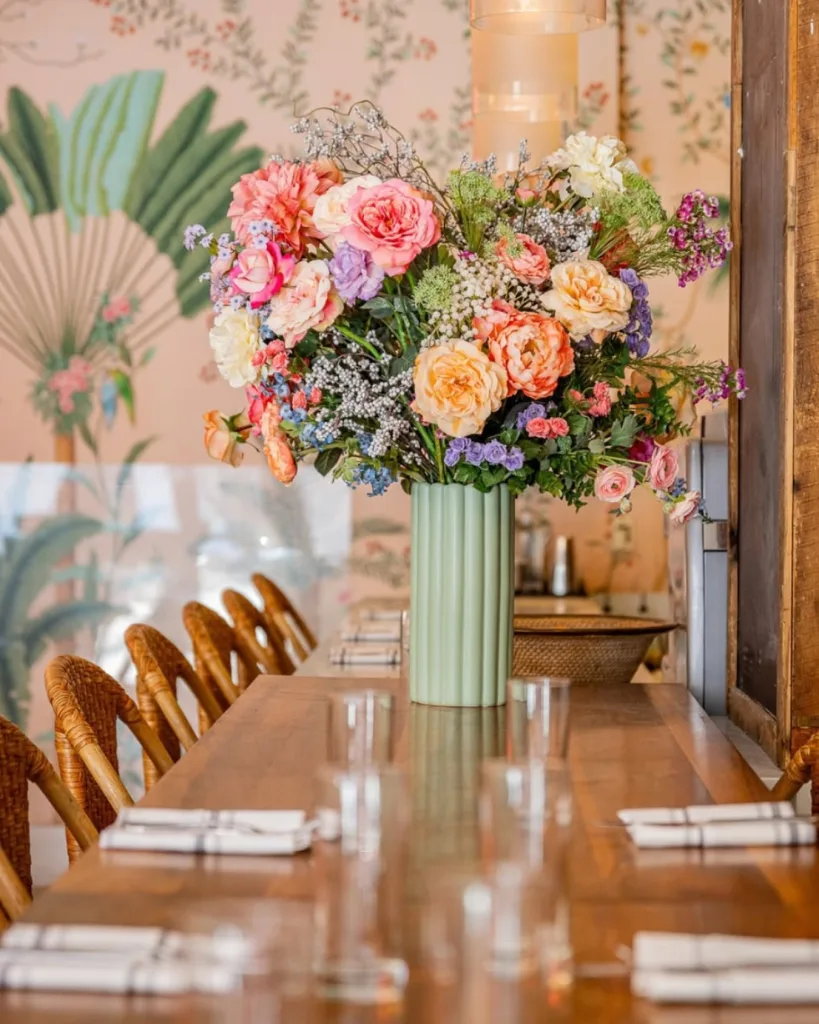 Interior of Orange Blossom Miami Beach with elegant Art Deco details and warm restaurant ambiance