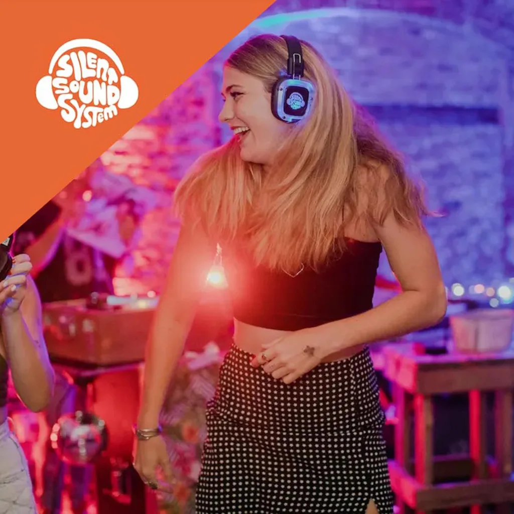 Guests dancing with wireless headphones at a silent disco party