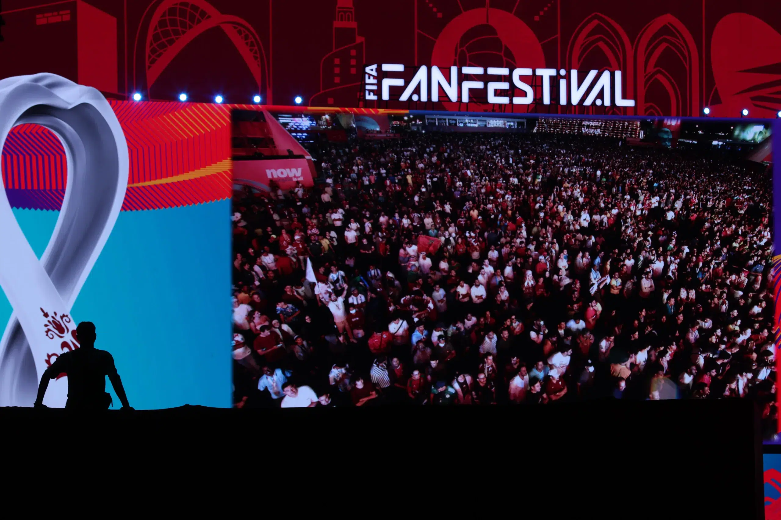 Massive crowd at the FIFA Fan Festival watching a live football match during the FIFA World Cup celebration.