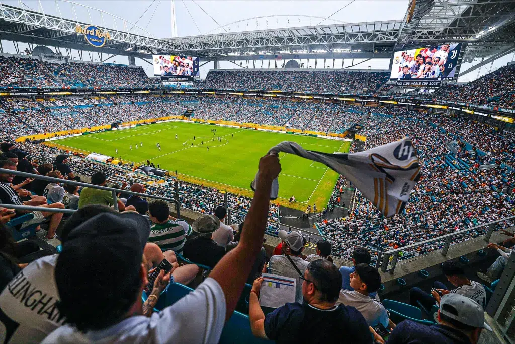 Fans watching a FIFA match inside Hard Rock Stadium in Miami during a major international soccer tournament.