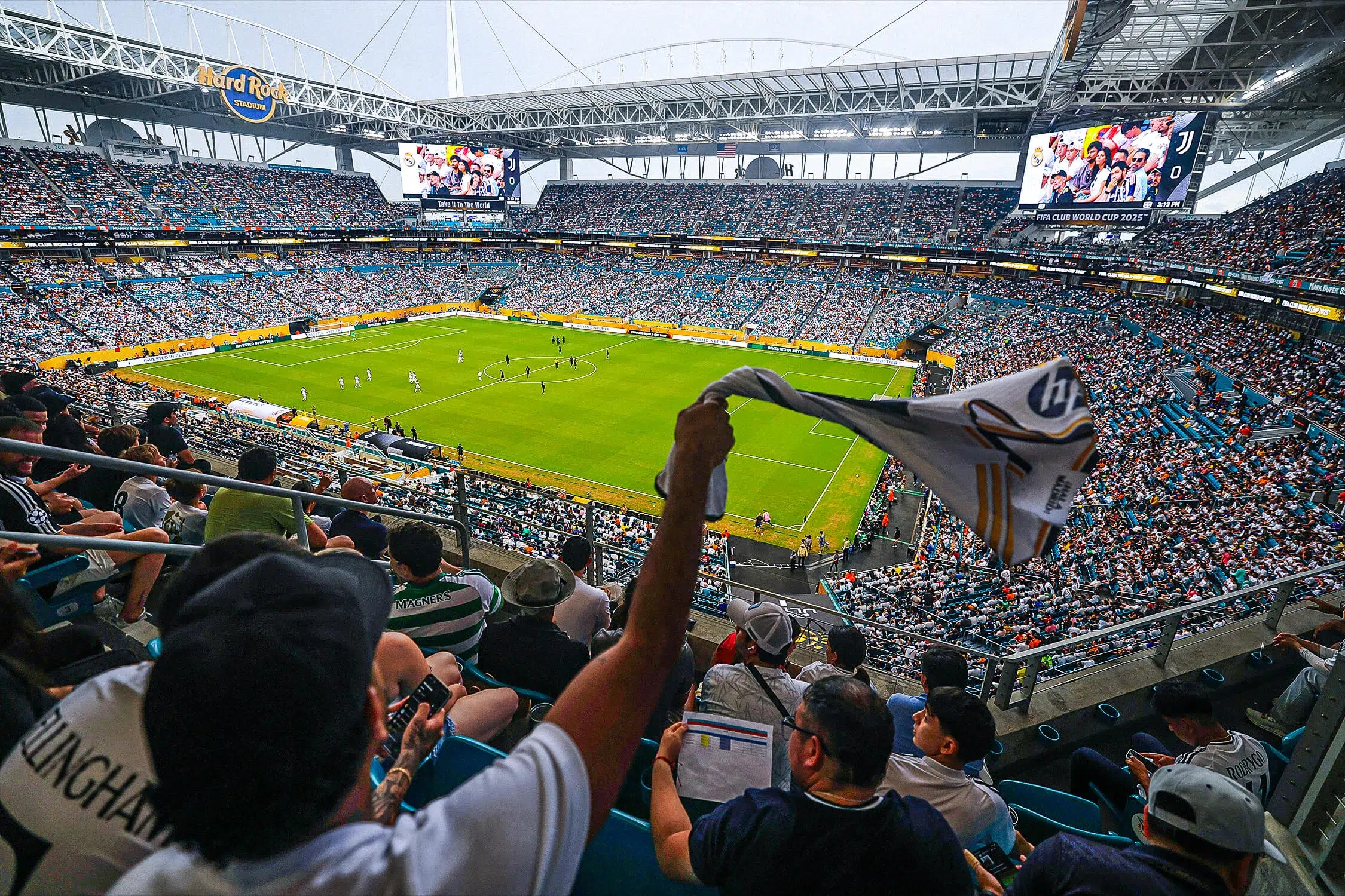 Fans watching a FIFA World Cup match inside a packed football stadium during the 2026 tournament.