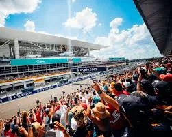 Miami F1 race track filled with audience, team areas and high speed action