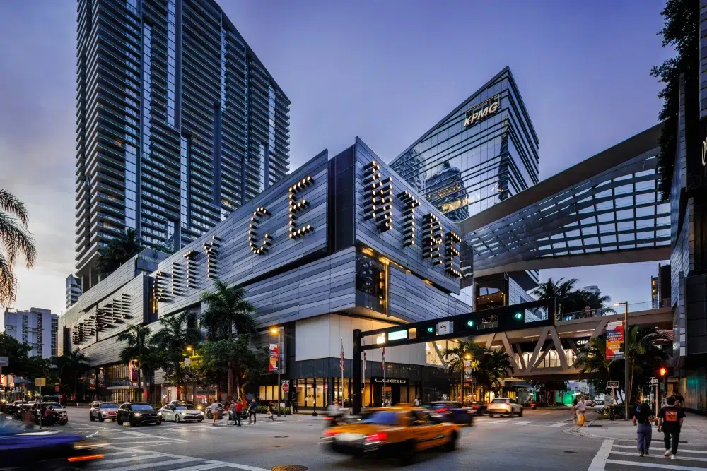 Brickell street scene with luxury buildings, palm trees and urban Miami energy