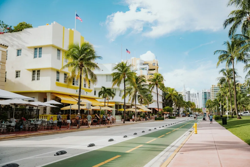 Ocean Drive in Miami Beach with colorful Art Deco buildings and palm trees.