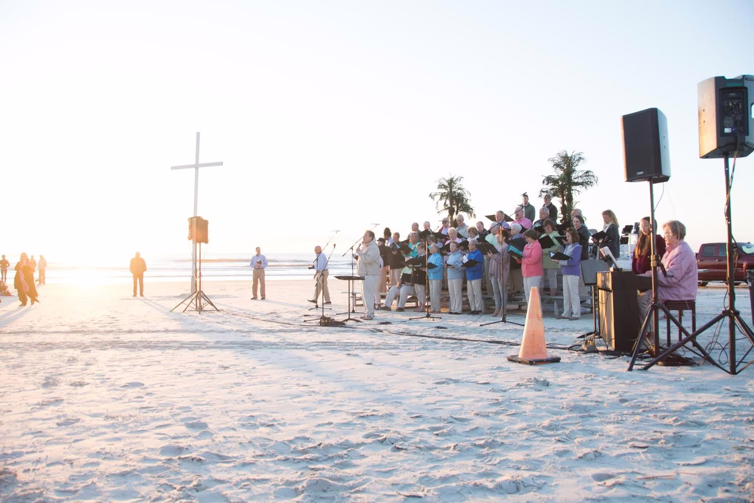 Christian Easter sunrise service on Miami Beach with worshippers gathered near the ocean at sunrise