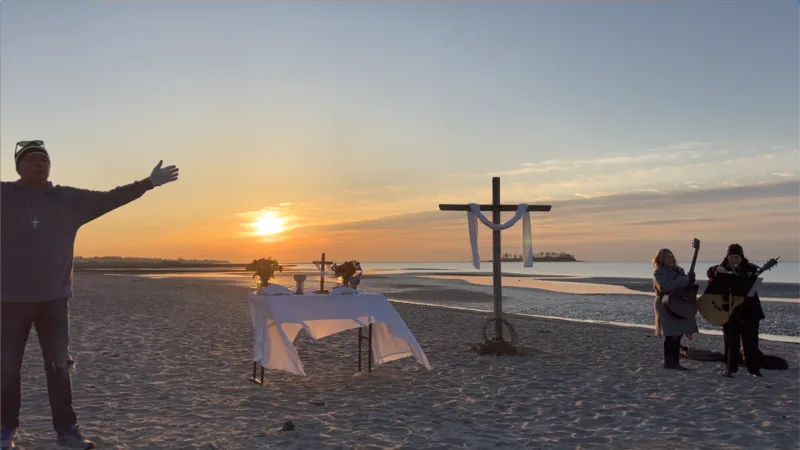 Cross and altar set on the beach during Easter sunrise worship service at Miami Beach