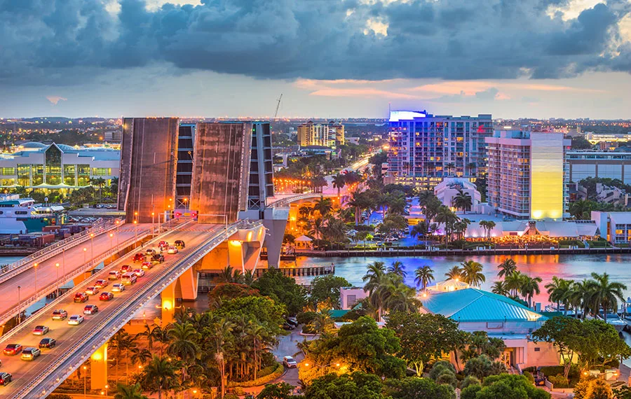 Downtown Fort Lauderdale with modern buildings, palm trees, and city streets
