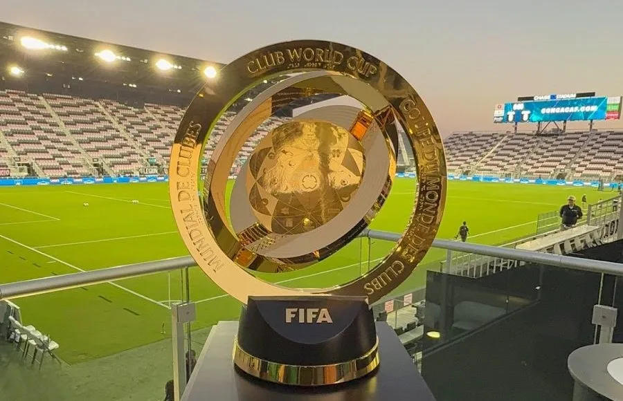 FIFA Club World Cup trophy displayed inside a football stadium in Miami ahead of a major international soccer event.