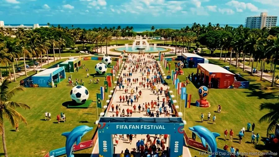 Large FIFA fan festival event in Miami featuring crowds, soccer-themed attractions, entertainment areas, and palm tree-lined outdoor gathering spaces near the beach.
