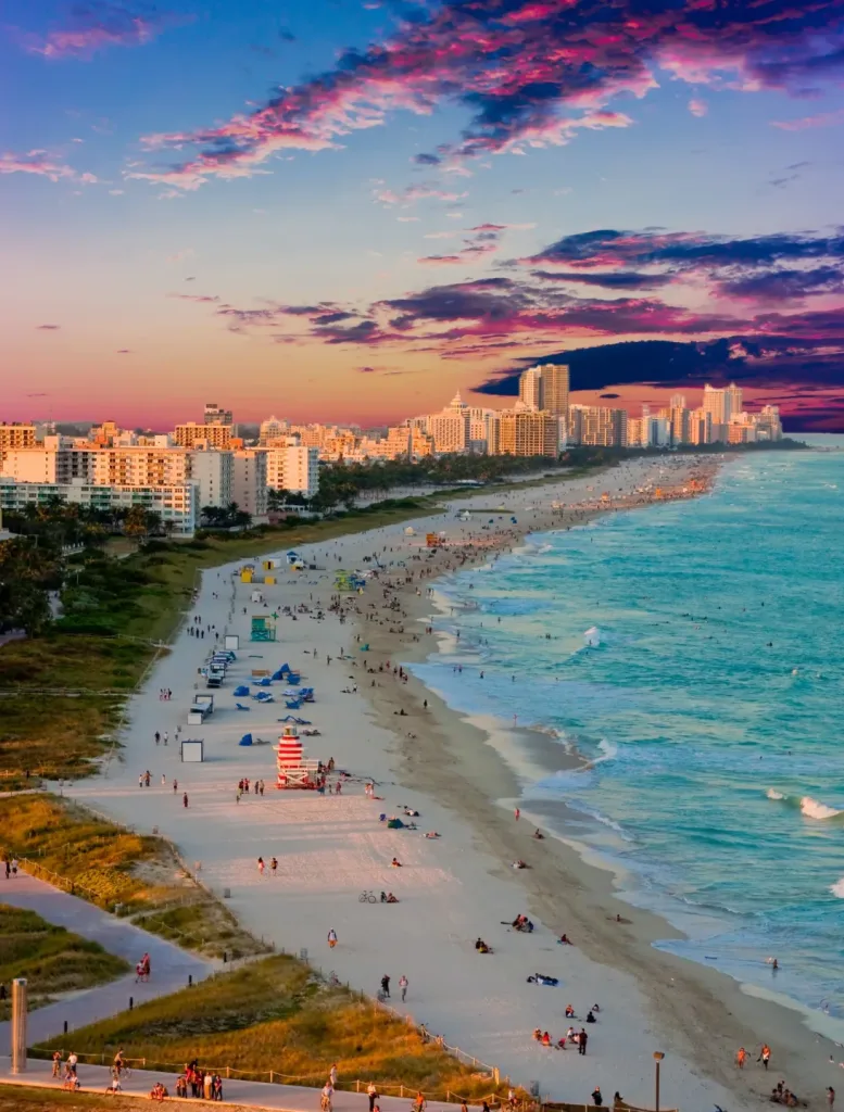 Sunny Miami Beach shoreline with turquoise water and white sand