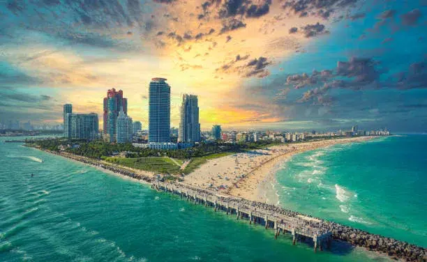 South Beach in Miami Beach with palm trees, sand, and ocean views