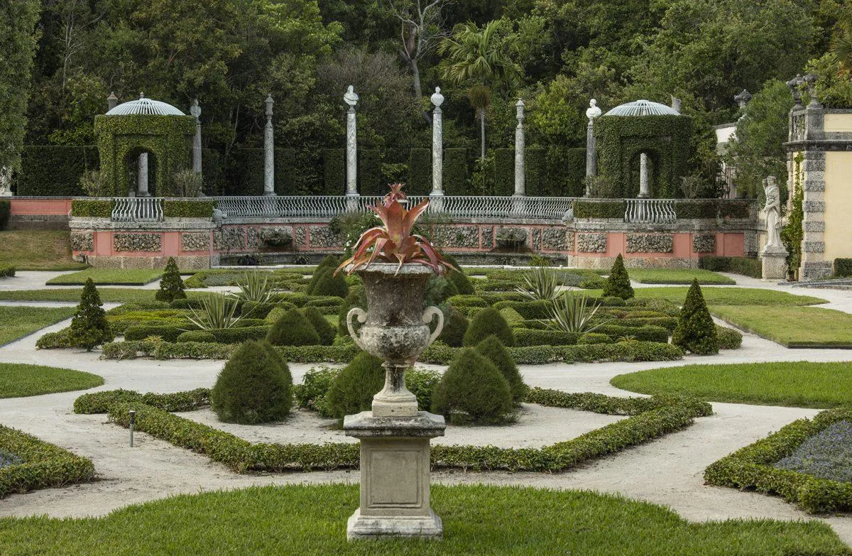 Beautiful landscaped gardens at Vizcaya Museum and Gardens in Miami with fountains, greenery, and classic architecture