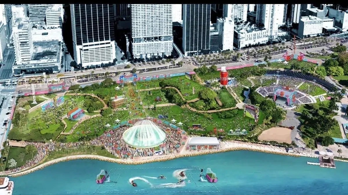 Aerial view of the FIFA Fan Festival at Bayfront Park in Downtown Miami, featuring large viewing areas, entertainment zones, waterfront attractions, and crowds gathered for World Cup celebrations.