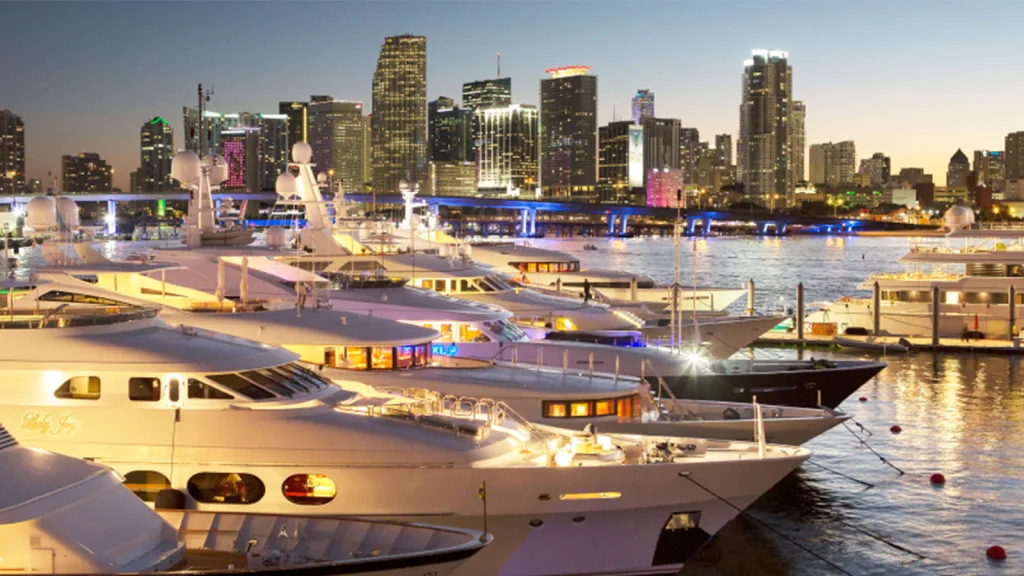 Several yachts docked near Miami Beach on a sunny day.